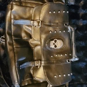 Black purse, unknown brand.